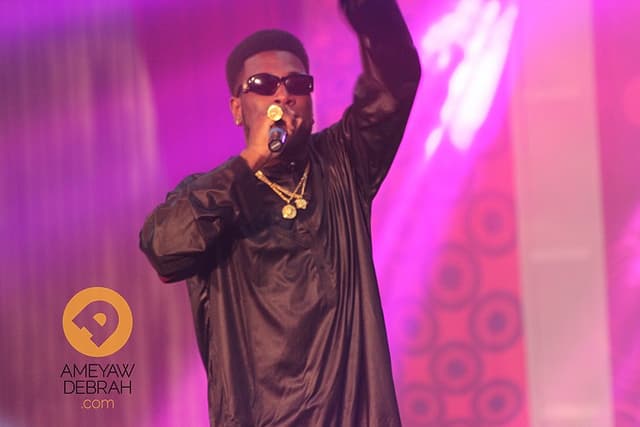 Person performing on stage - Afrobeats Artists to Watch in 2026