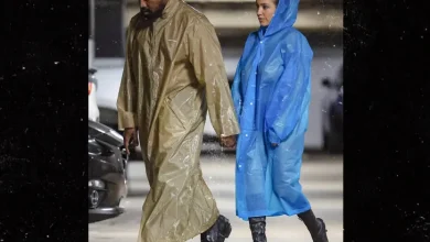 Kanye West'S Wife Bianca Goes Topless Again; This Time, With See-Through Raincoat 9